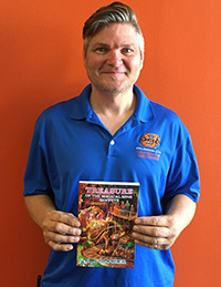 OSU-OKC HVAC Technician II K.J. Blocker holds the first copy of his book Treasure of the Magical Mine Moppets. The book is available for purchase July 31 at multiple retailers and is being published by MindStir Media. 
