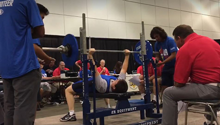 Wojcik during the weightlifting portion. Her maximum lift was measured in kilograms at 72.5 (160 pounds).